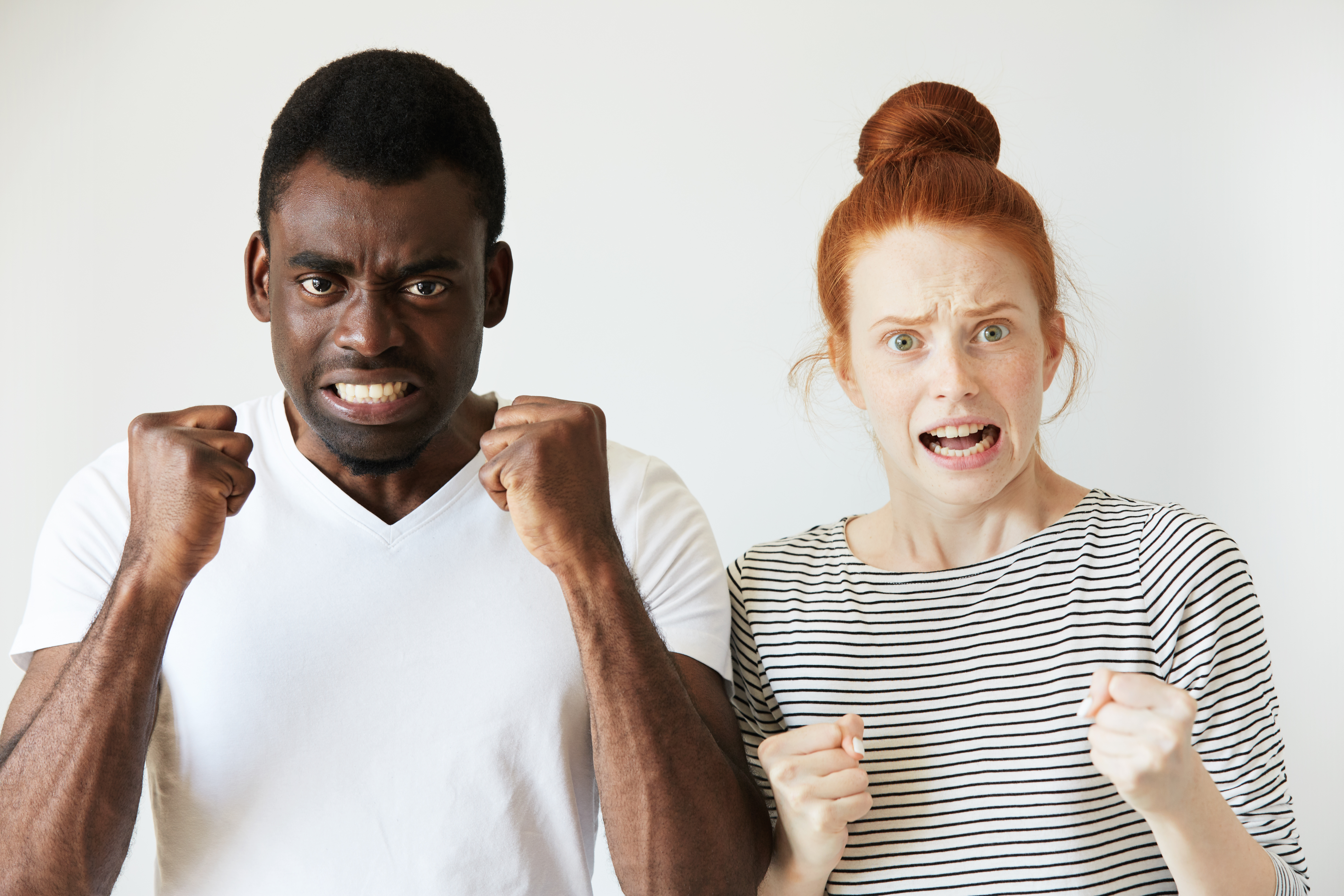 <a href="https://www.magnific.com/free-photo/african-man-white-t-shirt-redhead-caucasian-woman-striped-top_10323384.htm">Image by wayhomestudio on Magnific</a>